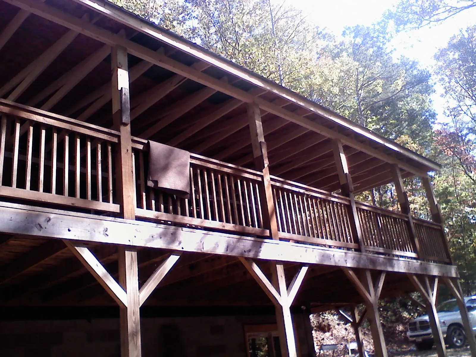 Timber framing under a new elevated porch and deck — Roof Leak Repair in East Grand Forks by Roofing Brothers